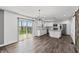 Bright, modern kitchen with white cabinets, stainless appliances and a patio door at 153 Terrace Ct, Franklin, IN 46131