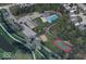 Aerial view of Deer Path Neighborhood Park featuring a pool, tennis court and basketball court at 15444 Old Pond Cir, Noblesville, IN 46060