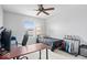 Small bedroom or office with desk, guitars and neutral paint at 15444 Old Pond Cir, Noblesville, IN 46060