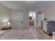 Tranquil bedroom with bathroom view, natural light, and stylish furniture at 1739 Wellesley Commons # 48A, Indianapolis, IN 46219