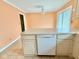 Kitchen featuring tile flooring, an eat-in bar and neutral countertop at 1761 Country Lane Dr, Greenfield, IN 46140