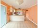 View of the kitchen featuring white cabinets, tile floors, and stainless steel appliances at 1761 Country Lane Dr, Greenfield, IN 46140