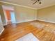The living room has hardwood floors and is bathed in natural light at 1761 Country Lane Dr, Greenfield, IN 46140