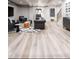 Large open basement with living area, modern furniture, and stylish decor for versatile use at 1802 Bellefontaine St, Indianapolis, IN 46202