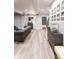 Finished basement with luxury vinyl floors, modern decor and a cozy seating area at 1802 Bellefontaine St, Indianapolis, IN 46202