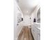 Clean bathroom with a modern vanity, large mirror, and a shower/tub combo for a refreshing experience at 1802 Bellefontaine St, Indianapolis, IN 46202