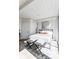 Well-lit bedroom with a view, showcasing stylish seating and contemporary design at 1802 Bellefontaine St, Indianapolis, IN 46202