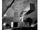 Unique home during construction at night, showcasing its innovative modular design being assembled at 1802 Bellefontaine St, Indianapolis, IN 46202