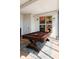 Stylish game room features a rustic pool table and music-themed wall art at 1802 Bellefontaine St, Indianapolis, IN 46202