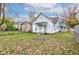 This home offers a grassy backyard surrounded by a chainlink fence for security at 1911 Wilcox St, Indianapolis, IN 46222