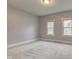Bright bedroom with soft carpeting and neutral walls at 1911 Wilcox St, Indianapolis, IN 46222