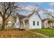 Charming single-Gathering home featuring a quaint front porch and well-maintained lawn at 1911 Wilcox St, Indianapolis, IN 46222