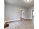 Open-concept living room features hardwood floors and ample natural light at 1911 Wilcox St, Indianapolis, IN 46222