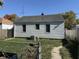 View of the backyard with a fence and an exterior view of the house at 1952 N Colorado Ave, Indianapolis, IN 46218
