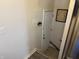 Mud room entry featuring gray vinyl plank flooring, coat hooks and a door to the outside at 1952 N Colorado Ave, Indianapolis, IN 46218