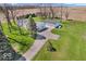 Picturesque aerial view of the home, highlighting its expansive yard and detached garage at 25249 State Road 13 N, Noblesville, IN 46060