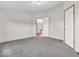 Neutral bedroom with wall-to-wall carpet and 2 doors at 25249 State Road 13 N, Noblesville, IN 46060