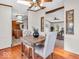 Sunlit dining area with seating for four, showcasing the open floor plan and natural light at 25249 State Road 13 N, Noblesville, IN 46060