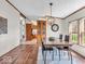 Elegant dining room featuring laminate flooring, modern lighting, and an open layout at 25249 State Road 13 N, Noblesville, IN 46060