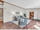 Spacious living room features a cozy seating arrangement and adjacent dining area at 25249 State Road 13 N, Noblesville, IN 46060