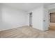 Bright bedroom offering neutral carpet, new paint, and a closet perfect for extra storage at 3105 N Tacoma Ave, Indianapolis, IN 46218