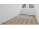 Bedroom with neutral carpet, white walls, and natural light from the two windows at 3105 N Tacoma Ave, Indianapolis, IN 46218