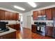 Well-lit kitchen with stainless steel appliances, plenty of storage, and modern finishes at 320 Legacy Blvd, Greenwood, IN 46143