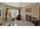Comfortable living room featuring natural light, neutral walls, and chair at 320 Legacy Blvd, Greenwood, IN 46143