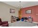 Bright living room showcasing neutral walls, hardwood flooring, and built-in bookshelves at 320 Legacy Blvd, Greenwood, IN 46143