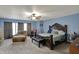 Bright bedroom with carpet, natural light, and stylish furniture offers a calm retreat at 320 Legacy Blvd, Greenwood, IN 46143