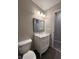Bathroom showcasing a marble vanity, updated lighting, and contemporary fixtures at , Indianapolis, IN 46221