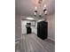 Well-lit kitchen with modern appliances and elegant chandelier at , Indianapolis, IN 46221