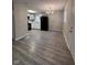 Open-concept kitchen and dining area featuring modern appliances and stylish chandelier at , Indianapolis, IN 46221