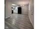 Bright kitchen and dining area with hardwood floors and modern lighting at , Indianapolis, IN 46221