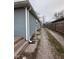 Exterior shot showcasing the side of the home and the gravel driveway at , Indianapolis, IN 46221