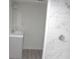 Modern bathroom featuring a vanity and a newly tiled shower with sleek fixtures at 3323 E 36Th St, Indianapolis, IN 46218