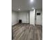 Spacious living room with vinyl floors and recessed lighting ready for you to add your personal touch! at 3323 E 36Th St, Indianapolis, IN 46218