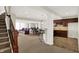 Finished basement featuring a wet bar, seating area, and plenty of room for entertaining and recreation at 3715 Kendall Wood Dr, Carmel, IN 46032