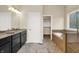 Bathroom featuring a soaking tub, step-in shower, double sink, and walk-in closet at 3715 Kendall Wood Dr, Carmel, IN 46032