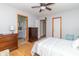 Cozy bedroom featuring hardwood floors and ensuite bathroom access at 377 Van Buren St, Greenfield, IN 46140