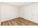 This room boasts modern wood flooring and neutral paint, awaiting personal touches at 3818 Gray Pond Ct, Indianapolis, IN 46237