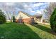 Well-maintained exterior with lush lawn and mature landscaping, adding to the curb appeal at 3818 Gray Pond Ct, Indianapolis, IN 46237