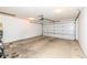 Spacious two car garage with an automatic garage door ready for vehicle storage at 3818 Gray Pond Ct, Indianapolis, IN 46237