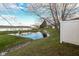 A serene pond view enhances this property's appeal, a picturesque sight from the yard at 3818 Gray Pond Ct, Indianapolis, IN 46237