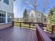 Wooden back deck offers space to entertain and enjoy the outdoor view at 3926 Castle Rock Dr, Zionsville, IN 46077