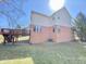 A beautiful backyard with a nice wooden deck and green grass at 3926 Castle Rock Dr, Zionsville, IN 46077