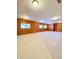 Expansive finished basement with natural light, offering ample space for recreation and Gathering activities at 3926 Castle Rock Dr, Zionsville, IN 46077