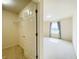 View of a bright bedroom with a closet, window, and neutral carpet, creating a cozy atmosphere at 3926 Castle Rock Dr, Zionsville, IN 46077