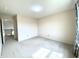 Bright bedroom with neutral walls, carpeted floor, and a window providing natural light at 3926 Castle Rock Dr, Zionsville, IN 46077