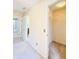 Bright hallway features neutral carpeting and access to a closet; perfect for seamless transitions throughout the home at 3926 Castle Rock Dr, Zionsville, IN 46077